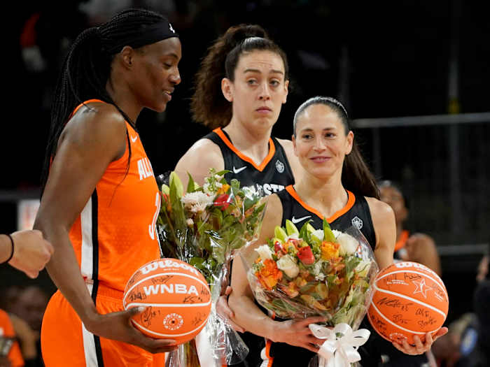 Sue Bird Sylvia Fowles are presented with flowers during the first half in a WNBA All Star Game.
